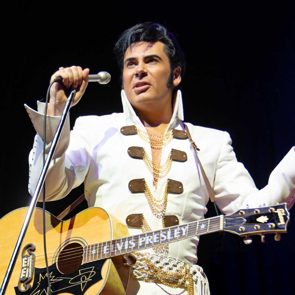 Mark Summers as Elvis Presley